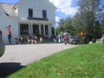 Most of the 60 people up in the Notch gathering outside the historic General Store at the Calvin Coolidge Homestead, by Terry Bascom