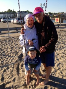 Margo & Tom Marrone with grandson, Owen, in ME. Photo by Melissa Perrino.